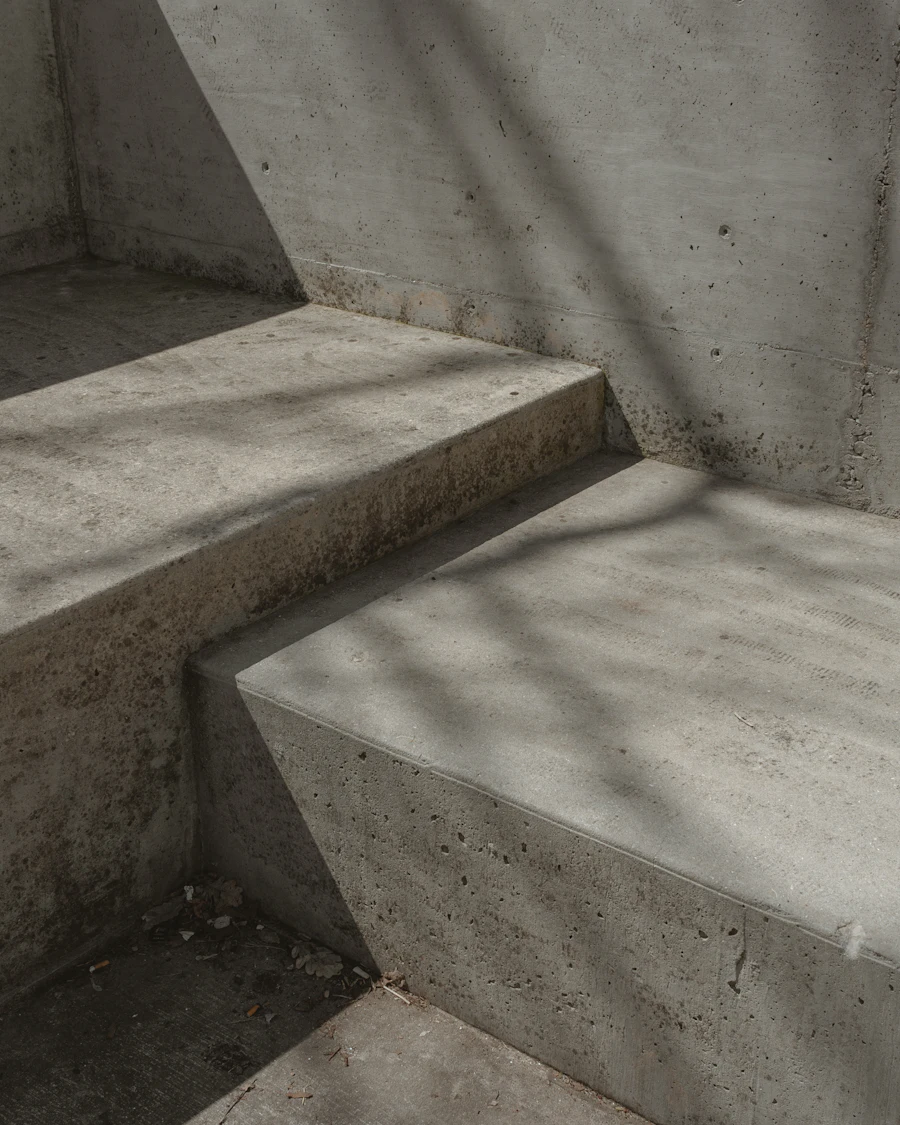 Raw concrete stair and wall in soft light